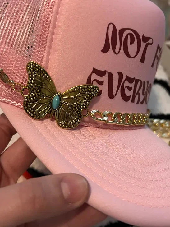 Gold butterfly trucker hat chain for women.