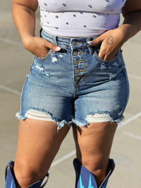 Thumbnail for Mid rise button fly cutoff denim shorts.