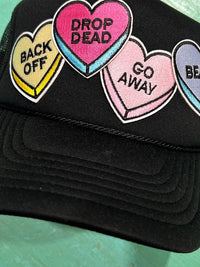 Thumbnail for Funny conversation hearts graphic trucker hat for women.