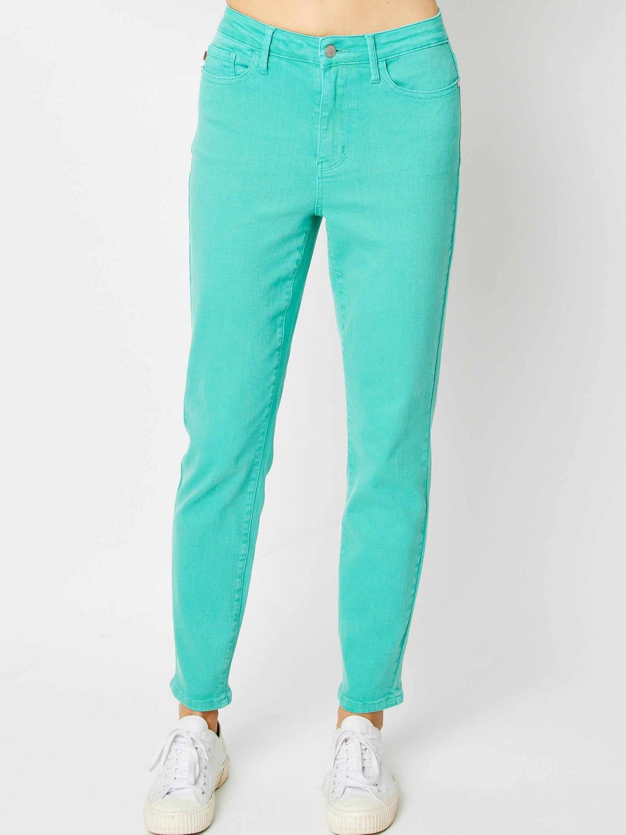 High waisted turquoise slim pants.