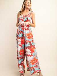 Thumbnail for Blue floral sleeveless wide leg jumpsuit.