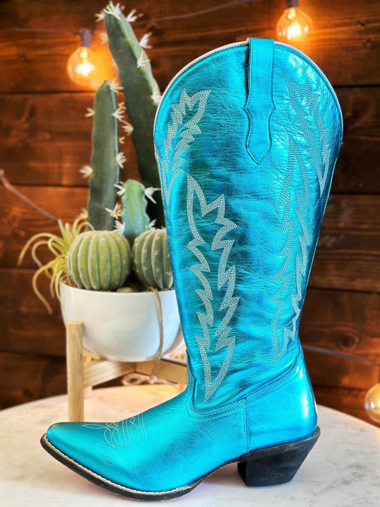 wide calf western boots in metallic turquoise