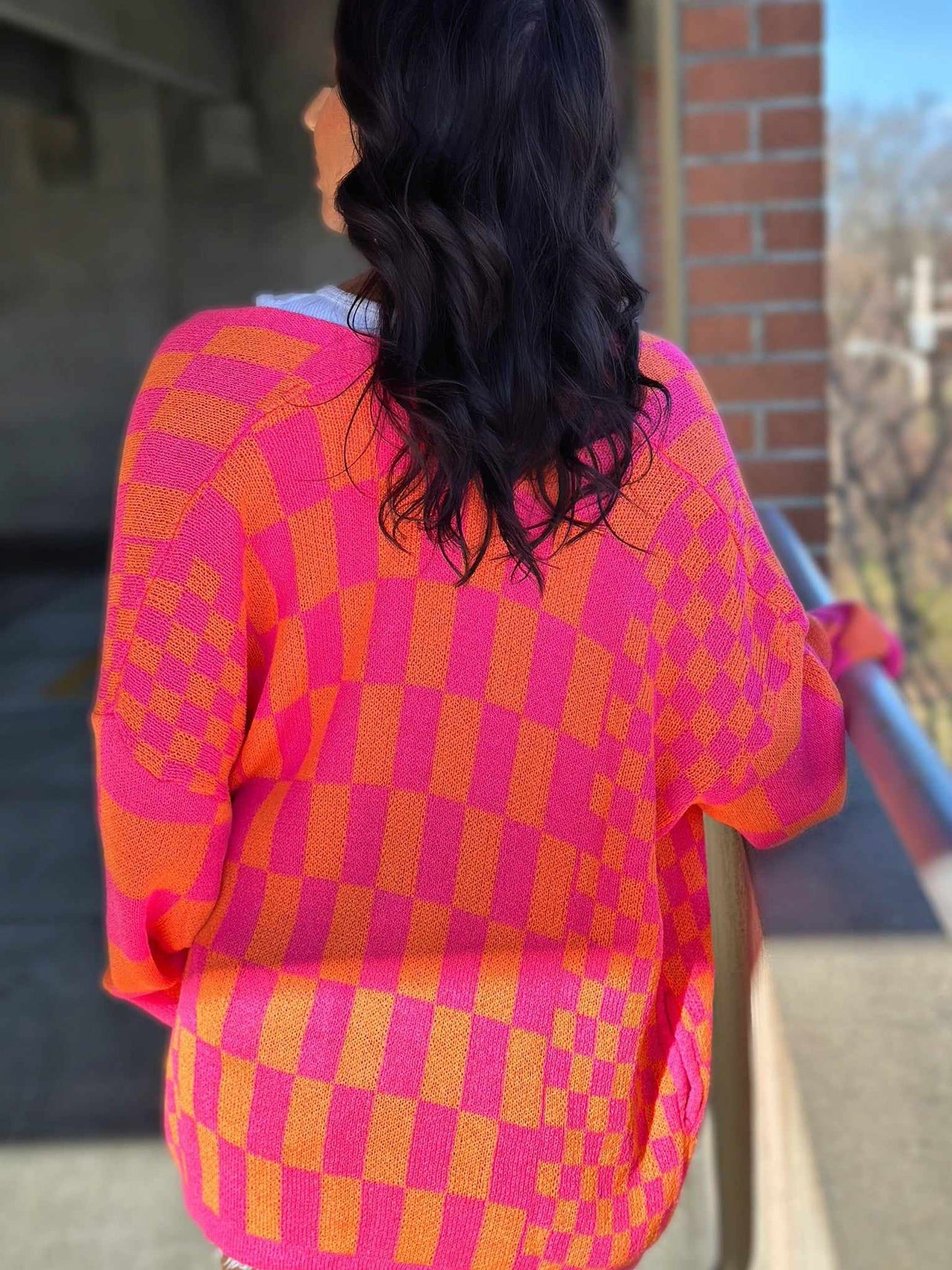 Checkered pattern cardigan in pink and orange