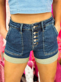 Thumbnail for Denim button fly cuffed shorts for women.