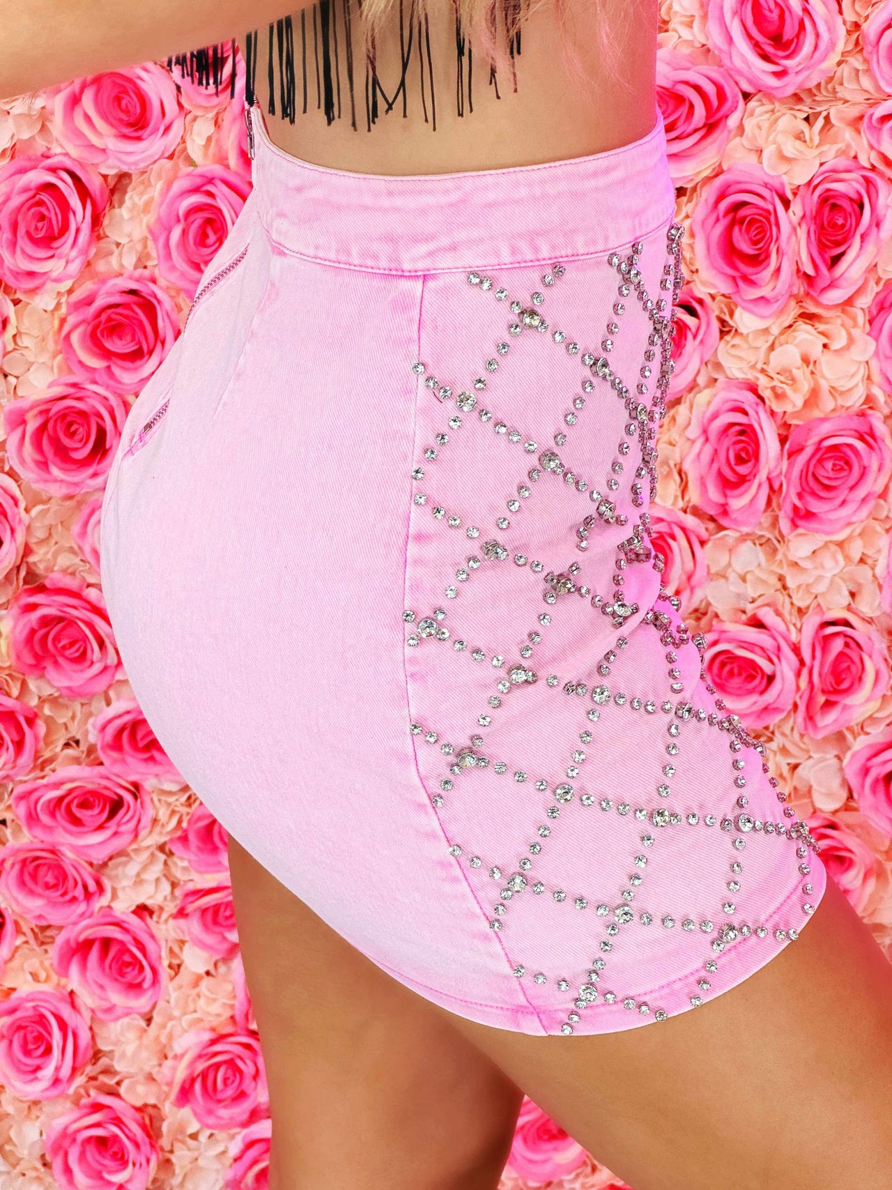 Pink jean mini skirt with rhinestones.