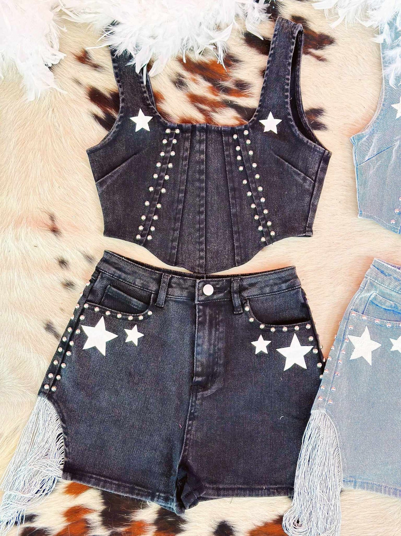 Black denim crop top and shorts with stars.