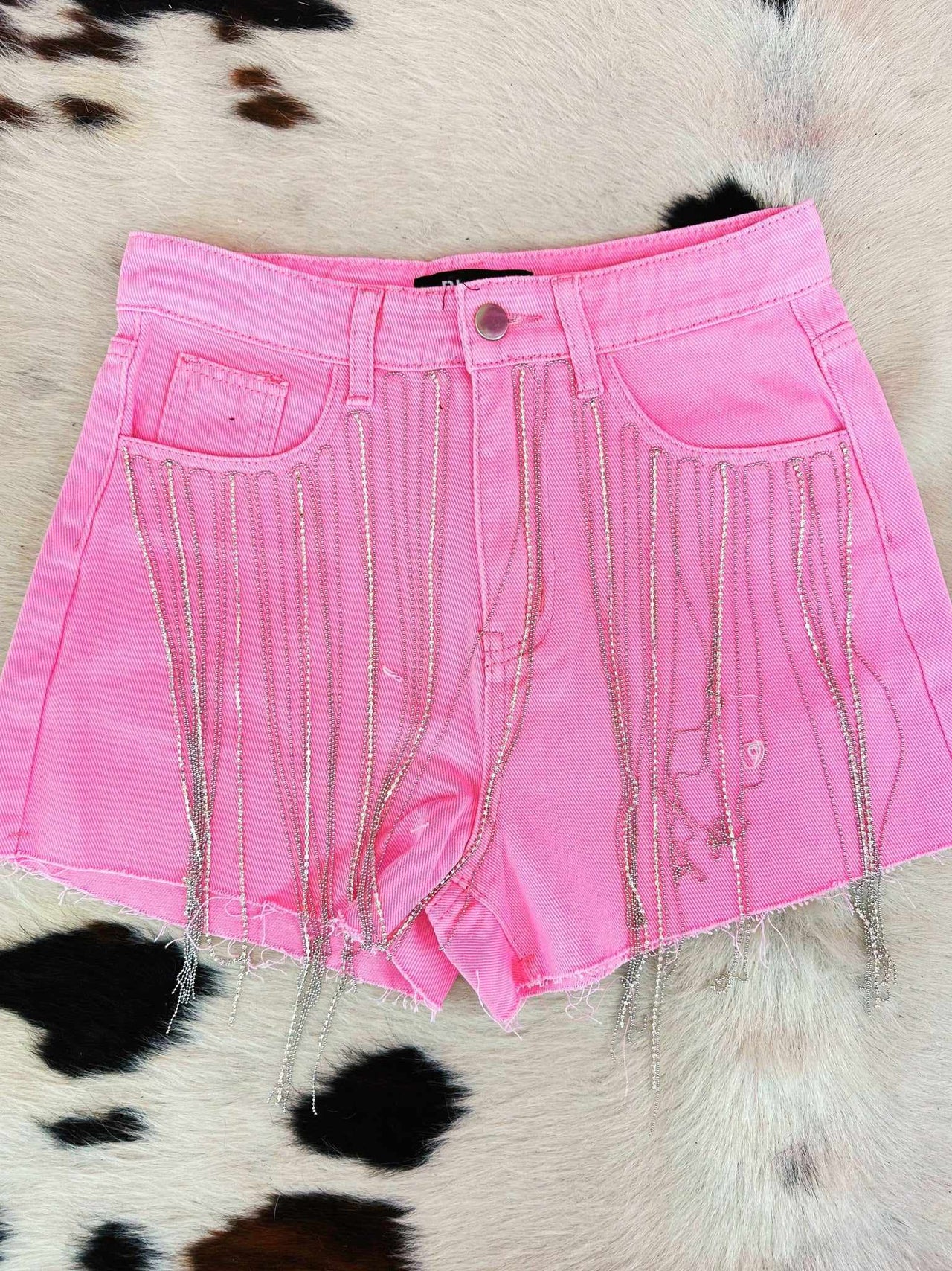 Pink denim shorts with rhinestone fringe