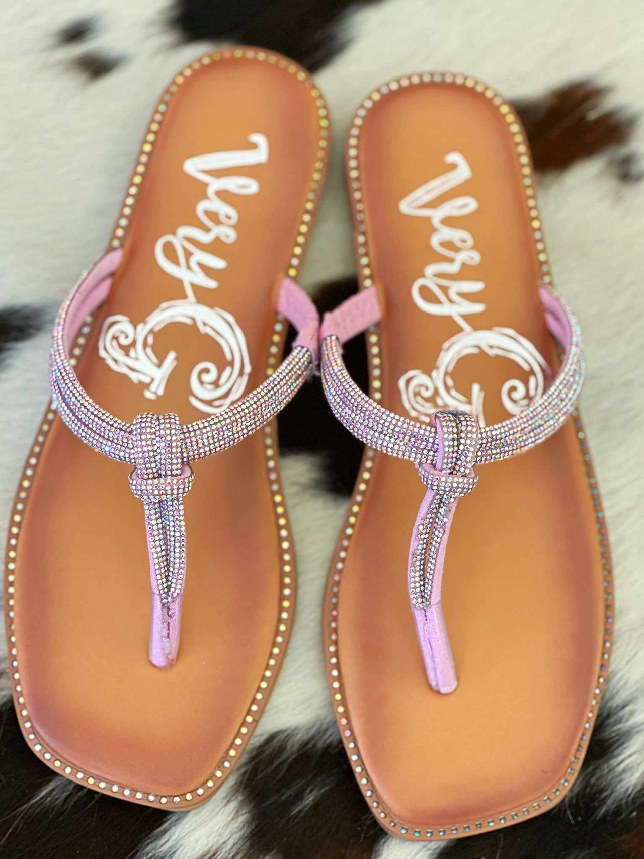Pink rhinestone thong sandal.