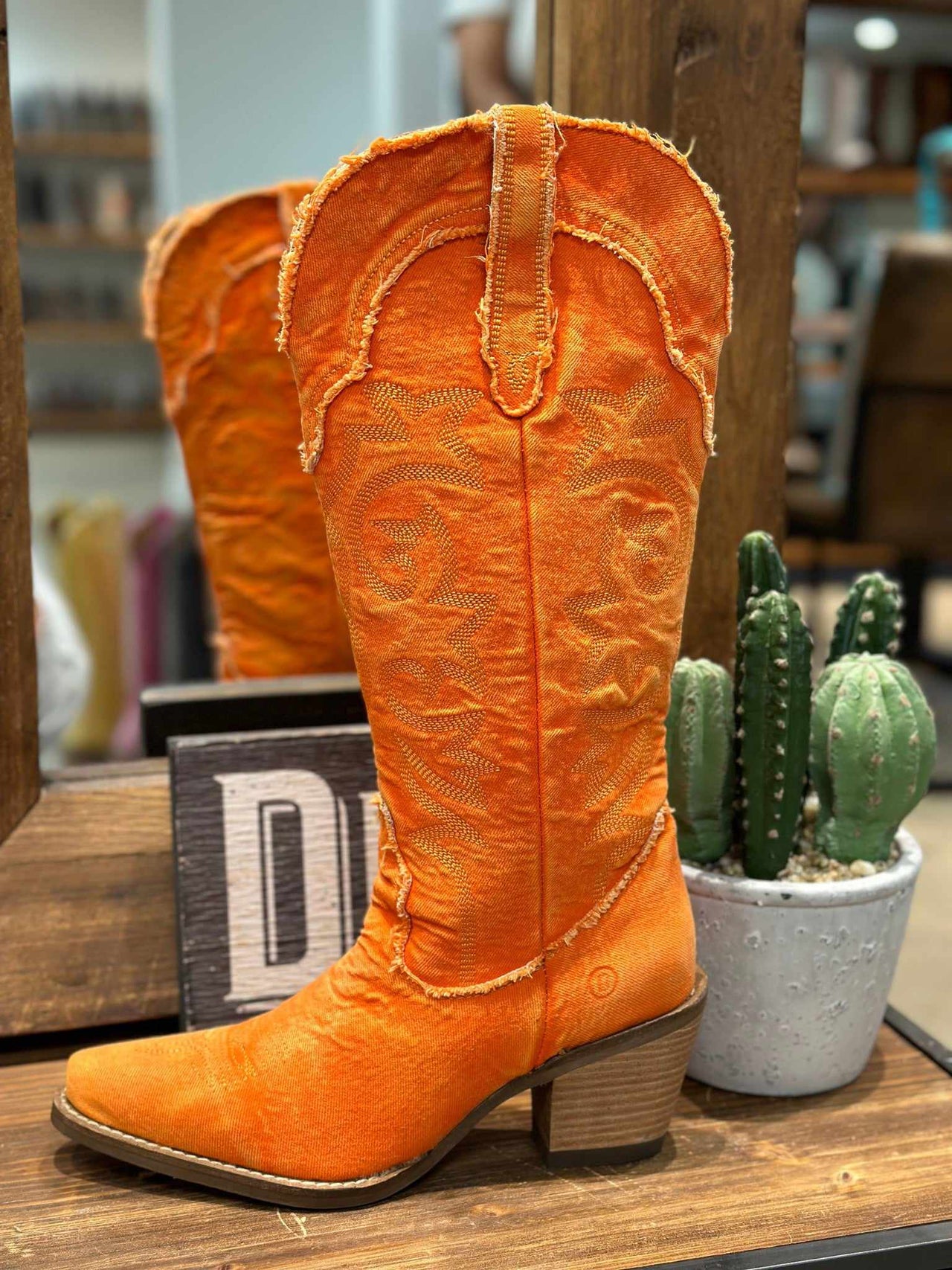 Orange denim cowgirl boots