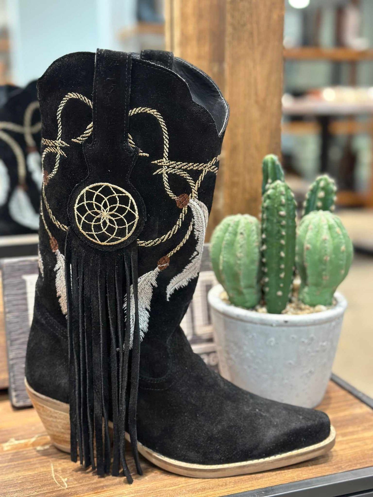 Black suede western boots with feather embroidery and fringe