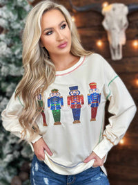 Thumbnail for Cream holiady sweater with sequin nutcrackers