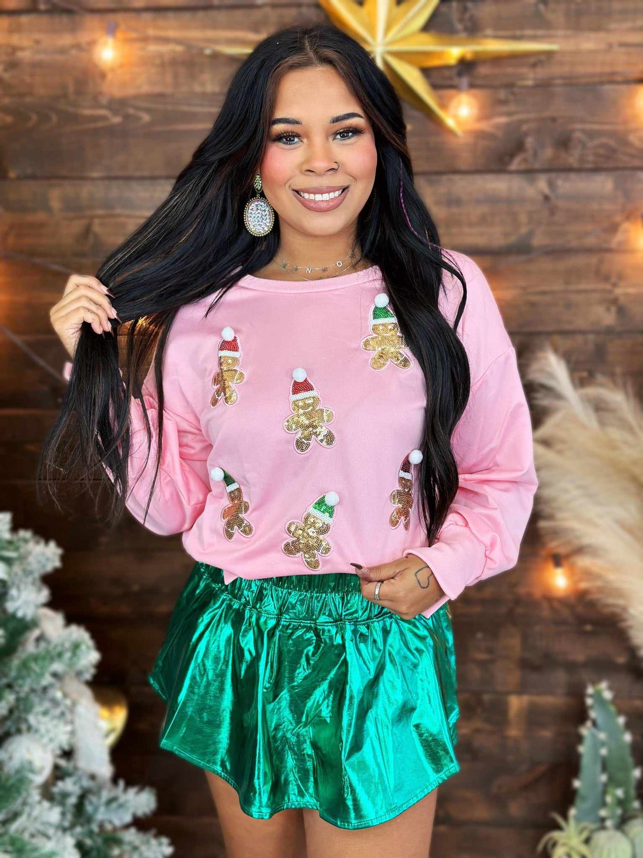 Pink sweater with sequin gingerbread men