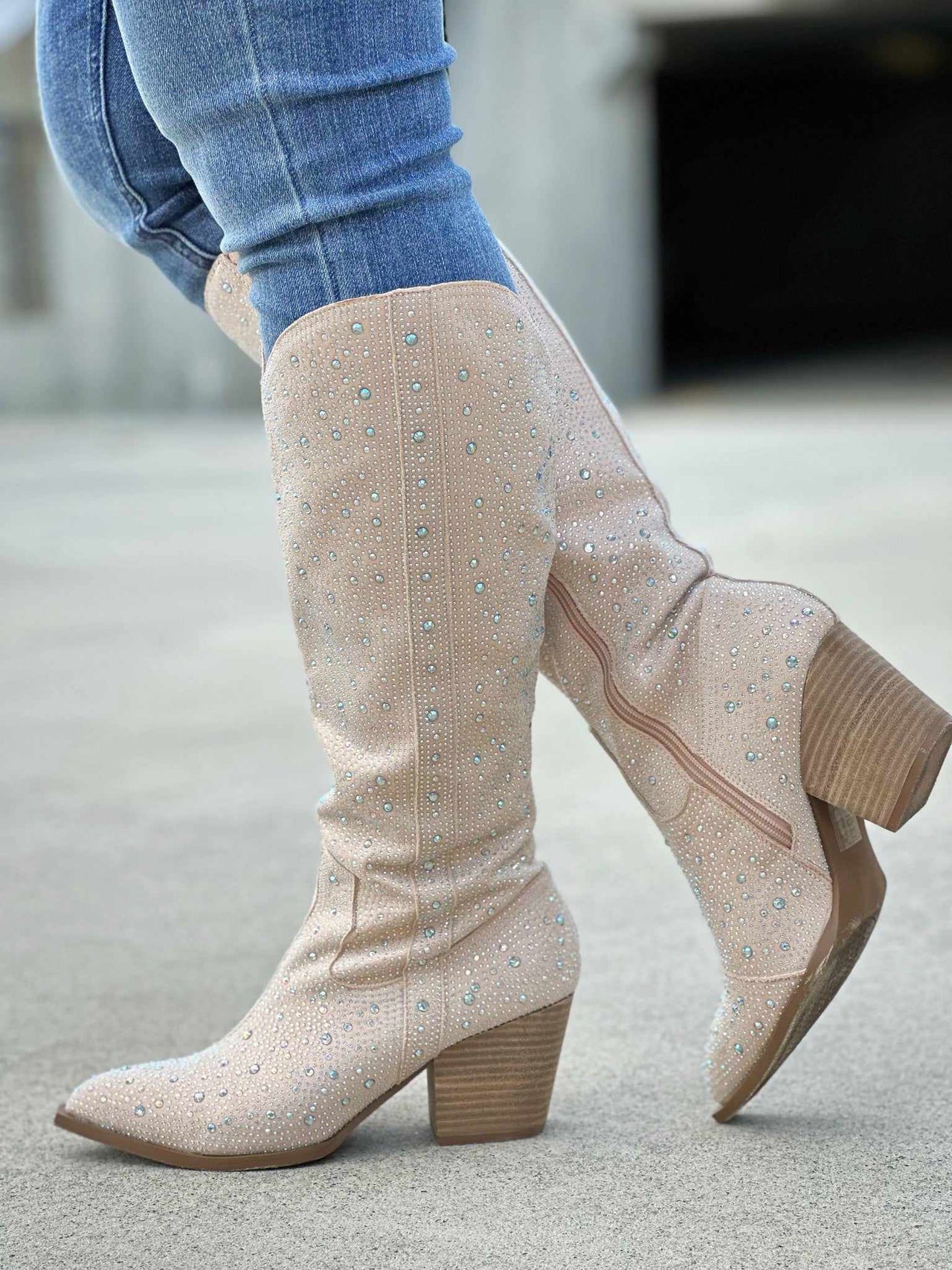 Cream Rhinestone cowgirl boots.