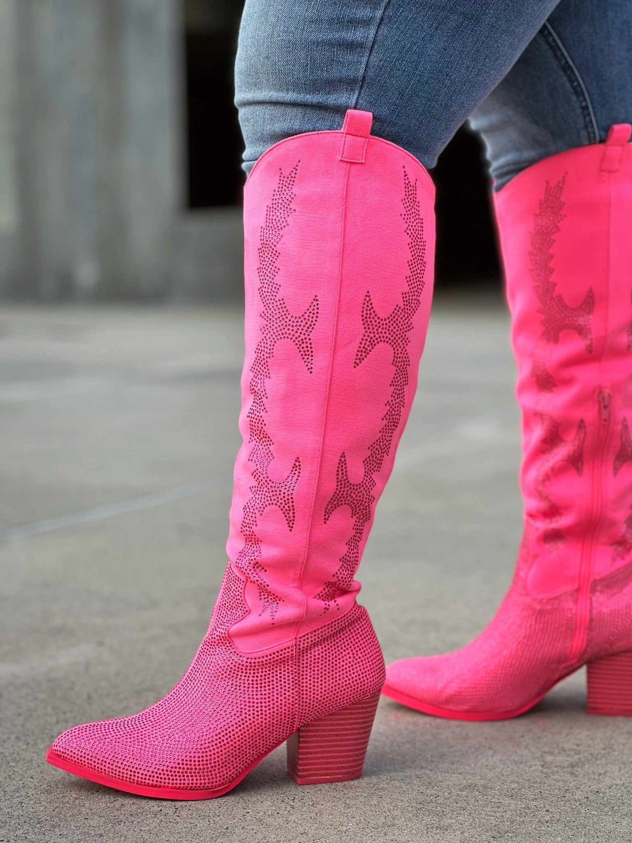 Wide calf pink rhinestone boots.