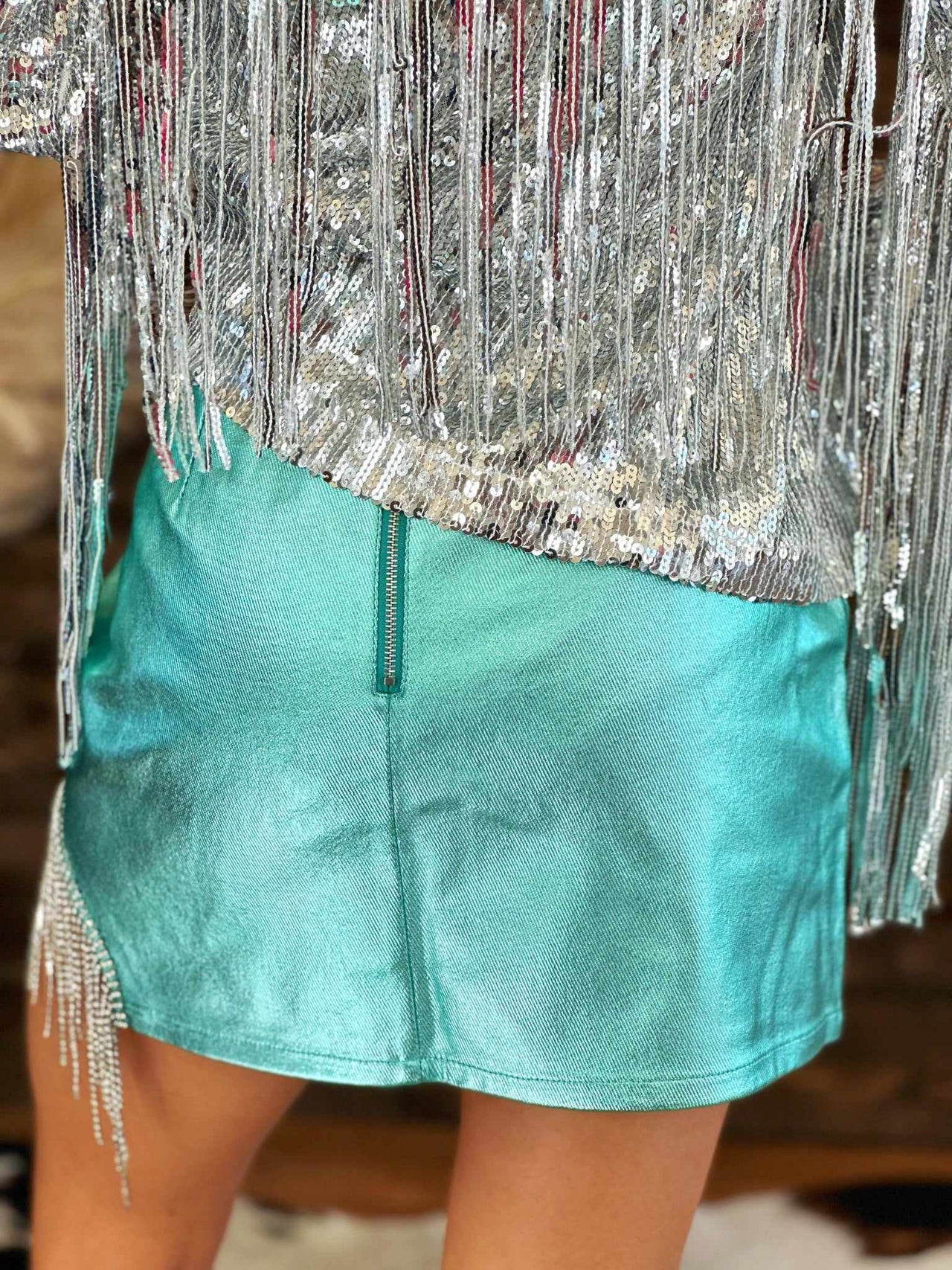 Metallic emerald mini skirt