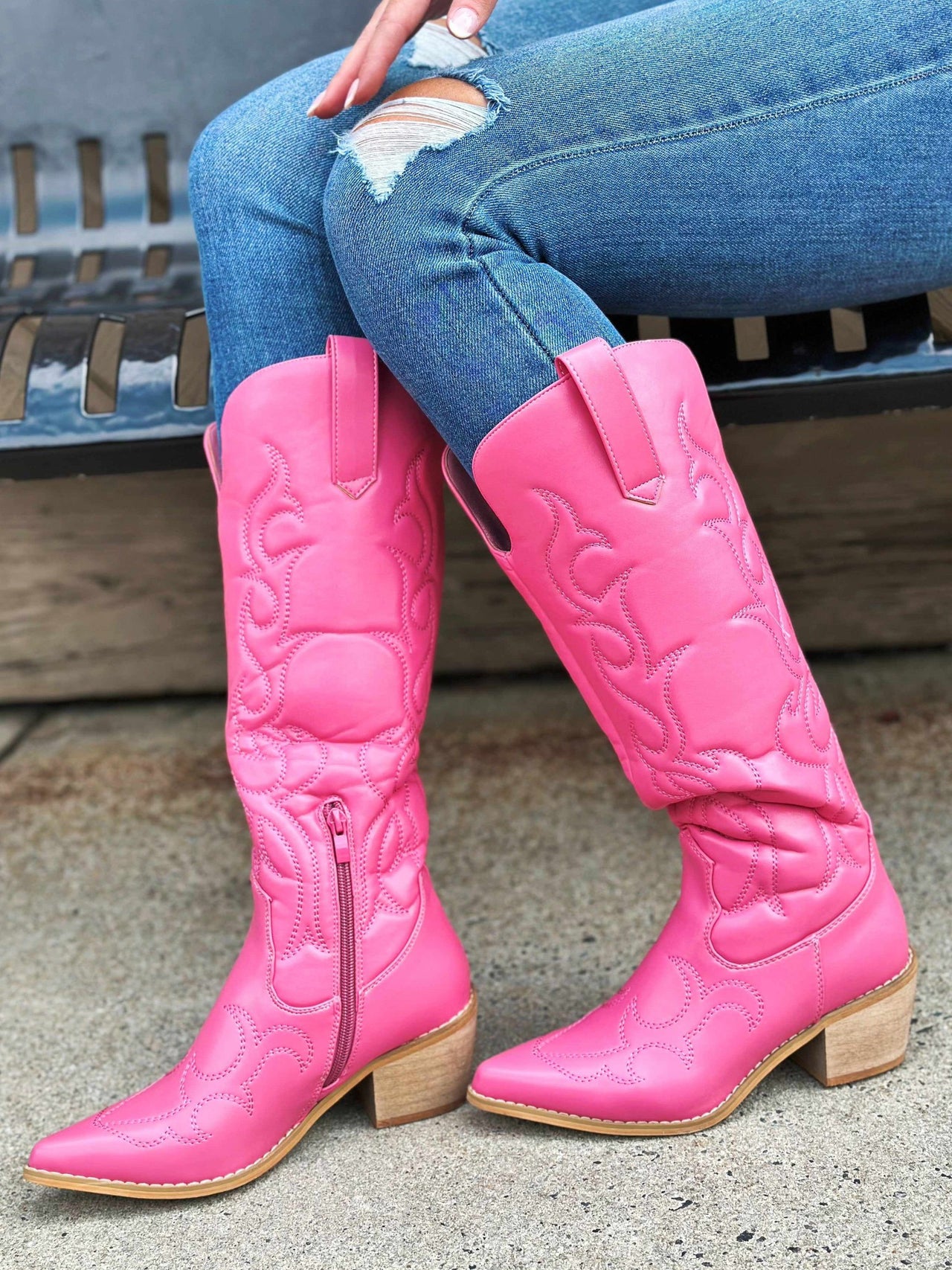 Barbie pink western boots.