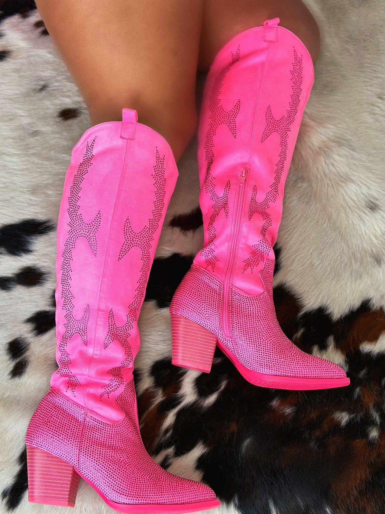 Wide calf pink western boots with rhinestones.