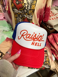Thumbnail for Raisin Hell Trucker Hat - Red White and Blue