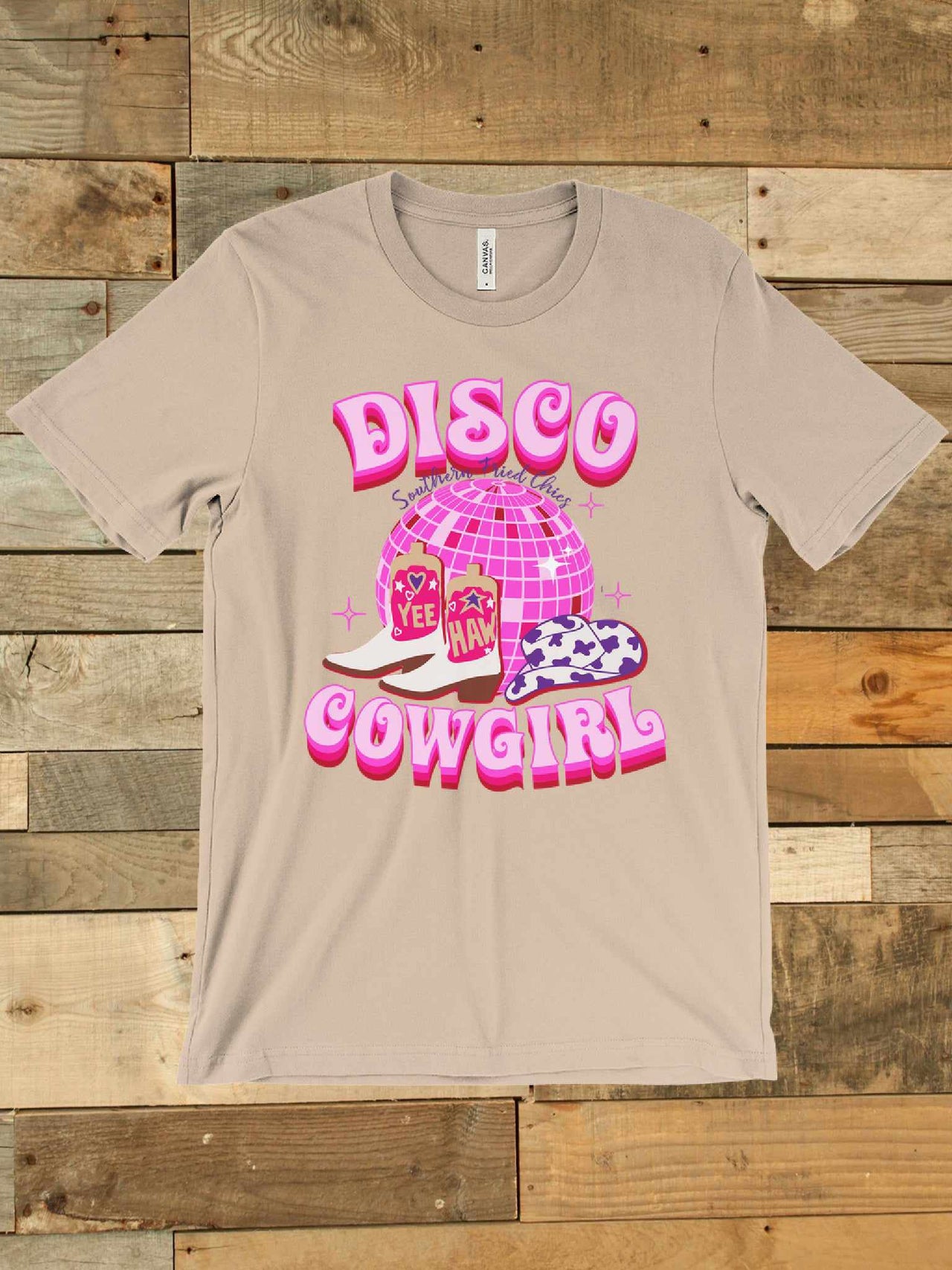 "Disco Cowgirl" t-shirt with disco ball and western boots.