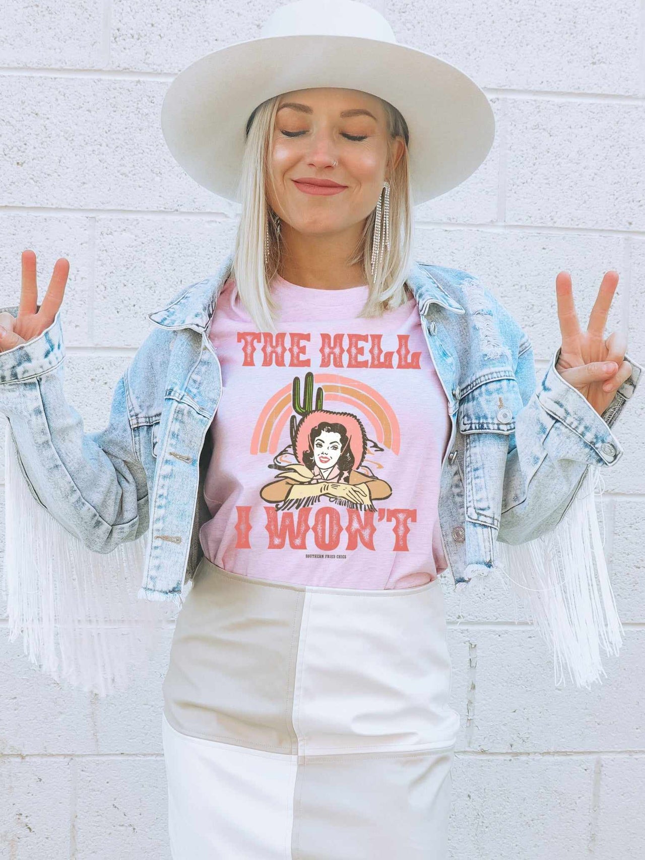 Casual western outfit for women. "The Hell I Won't" graphic tee.