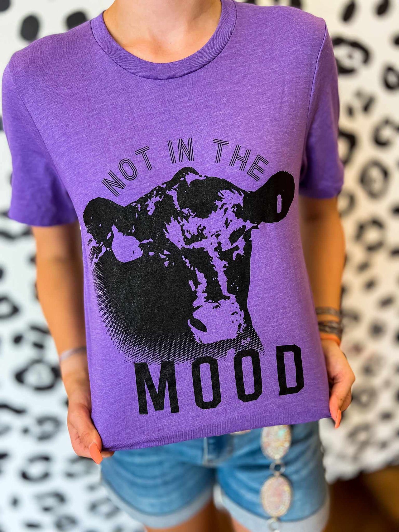 Not in the Mood" Cow graphic tee for women.