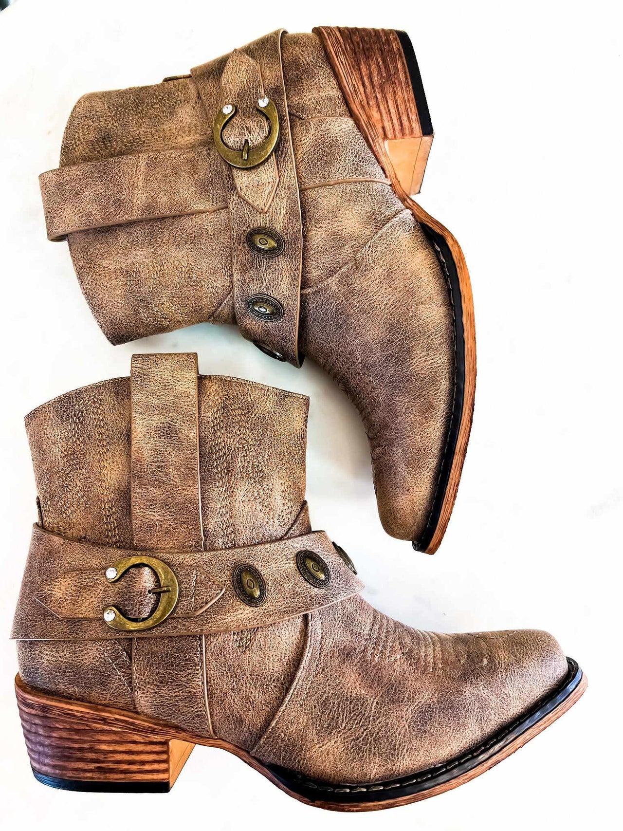 Taupe leather booties with buckles