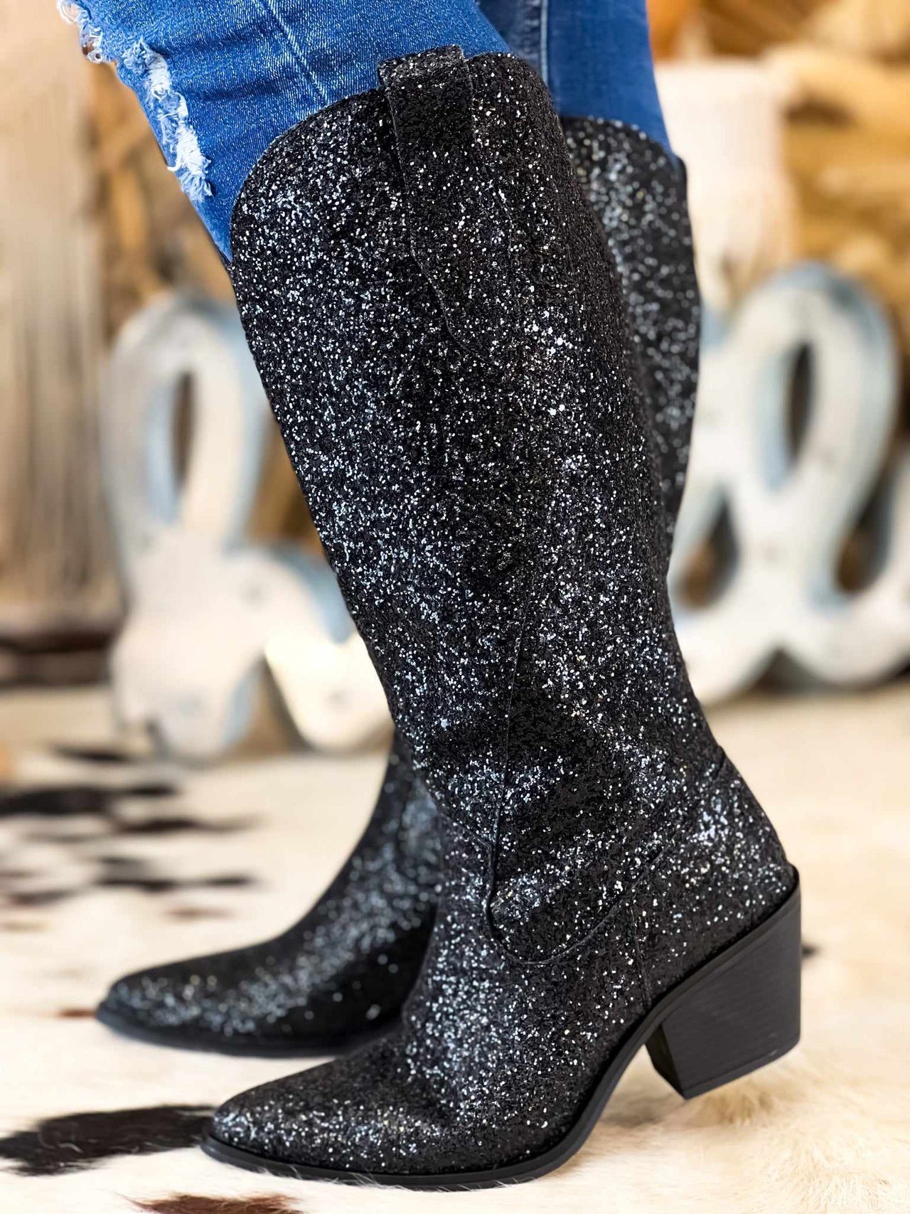 black western boots with glitter.