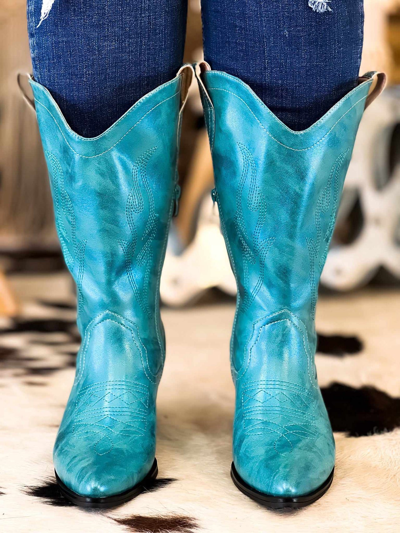 Metallic turquoise western boots.