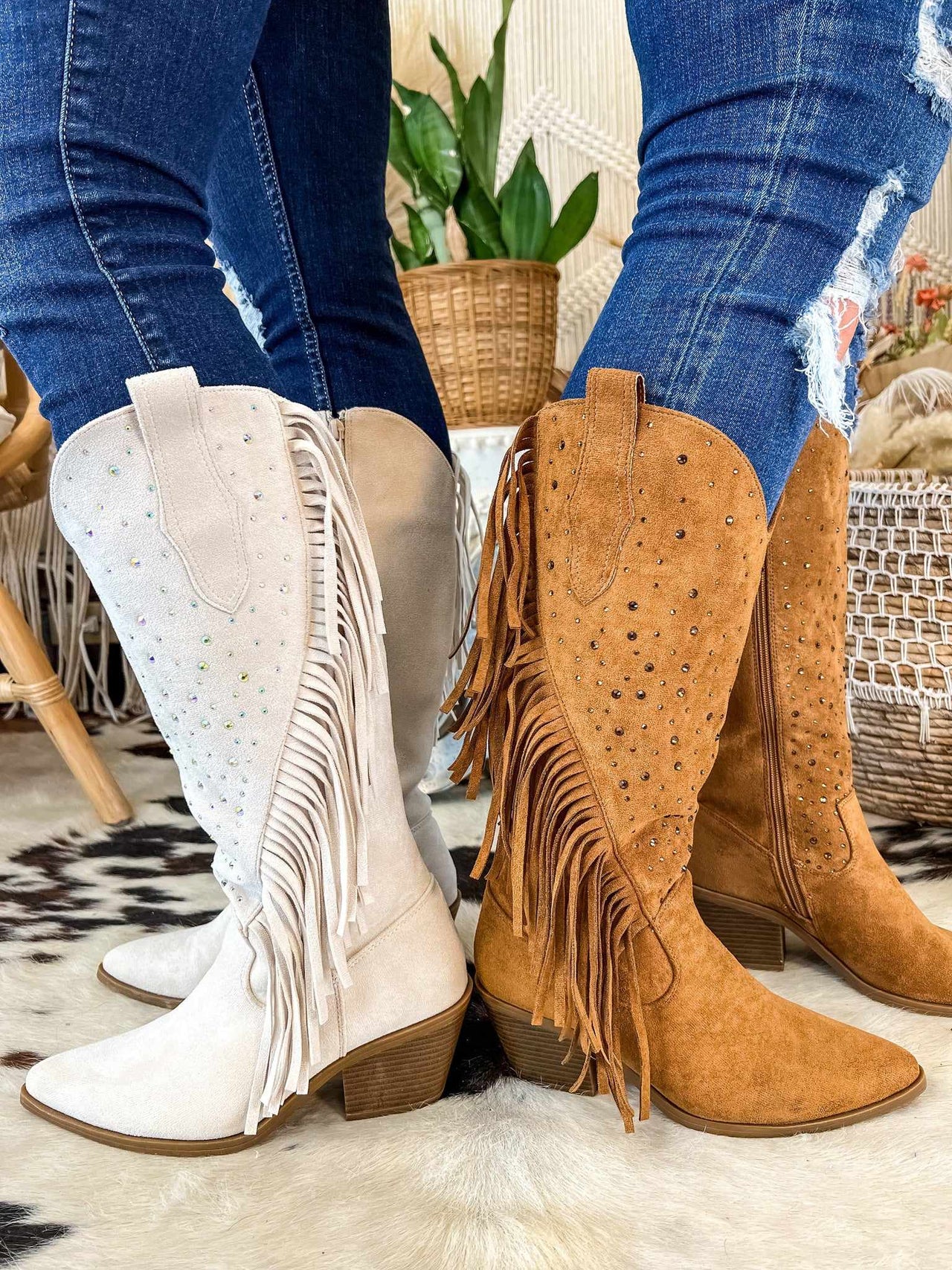 Wide leg suede boots with fringe.