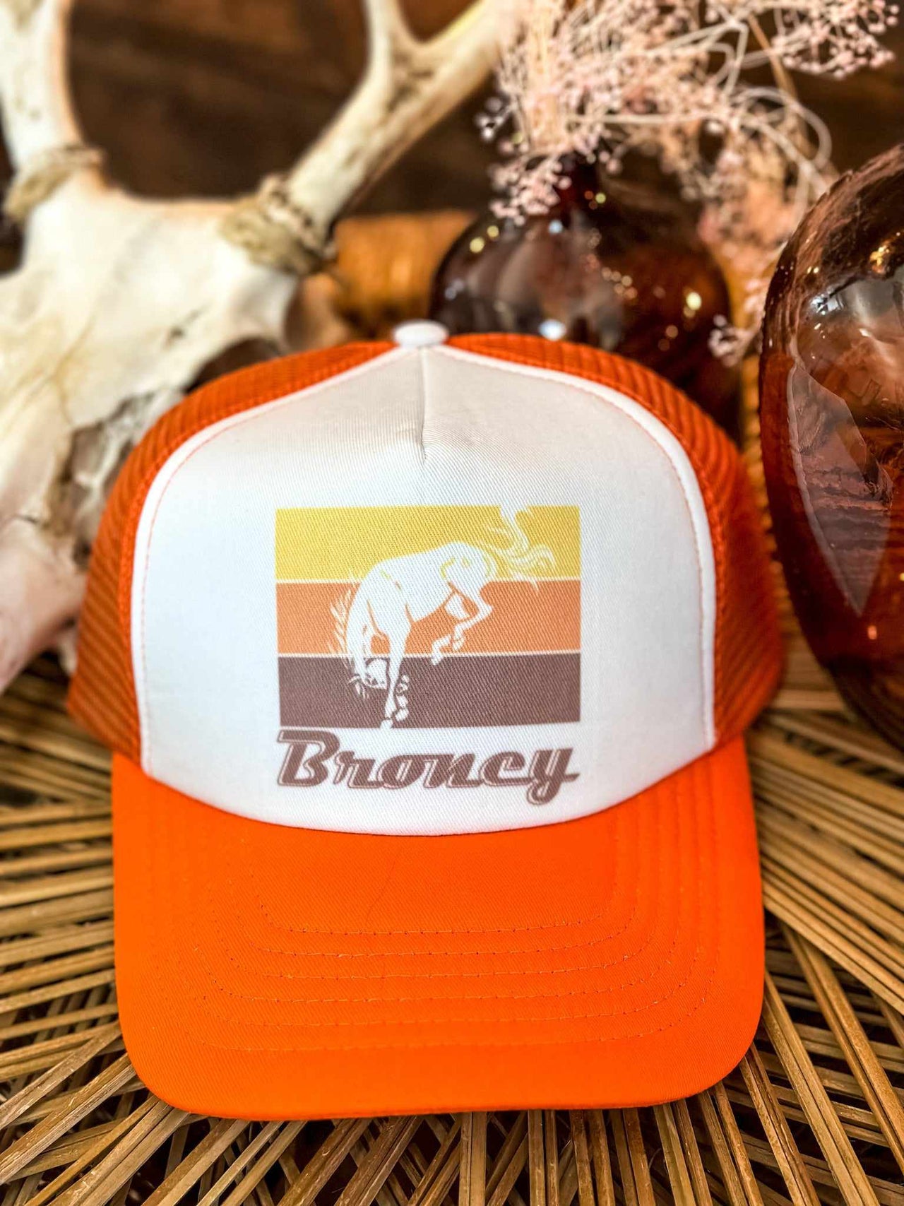 Broncy Neon Orange Trucker Hat