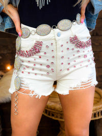 Thumbnail for White denim shorts studded with pink gems.