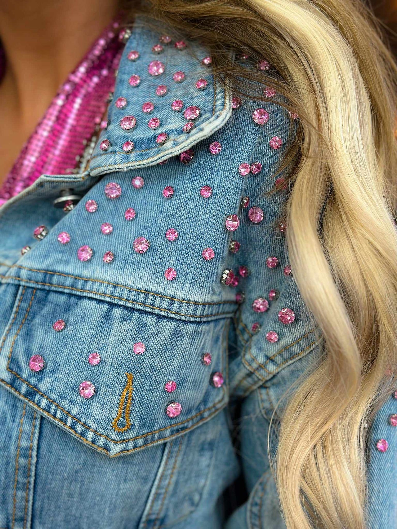 Pink gem studded jean jacket for women.