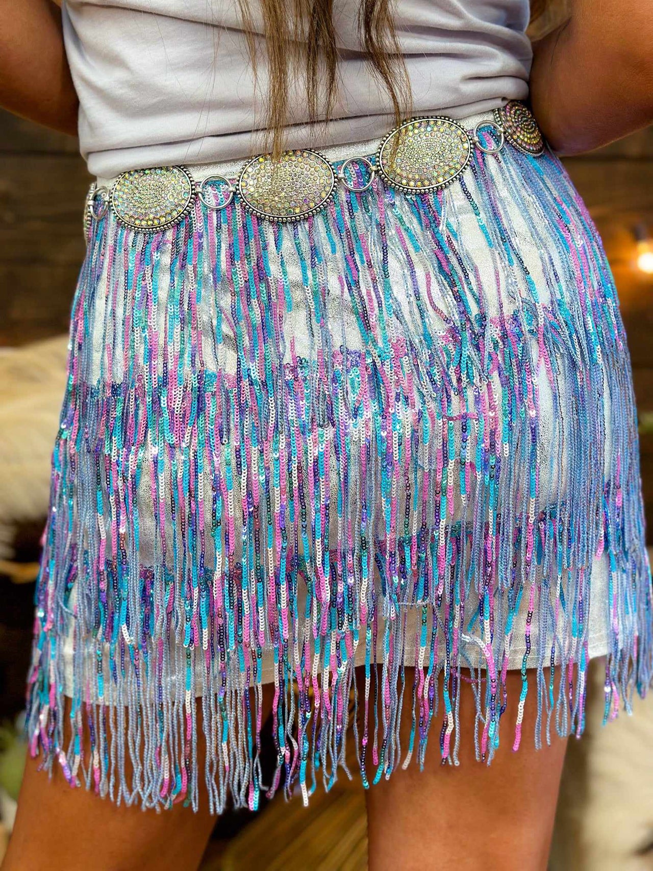Sequin fringe tiered mini skirt in blue and purple.