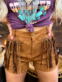 Thumbnail for Brown suede shorts with studded fringe.