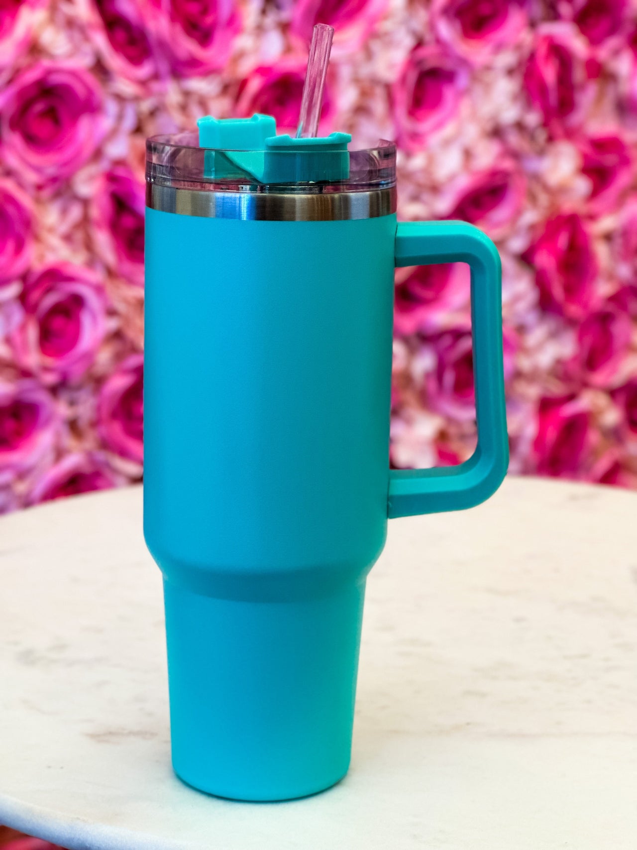 Teal blue 40oz stainless steel tumbler. 