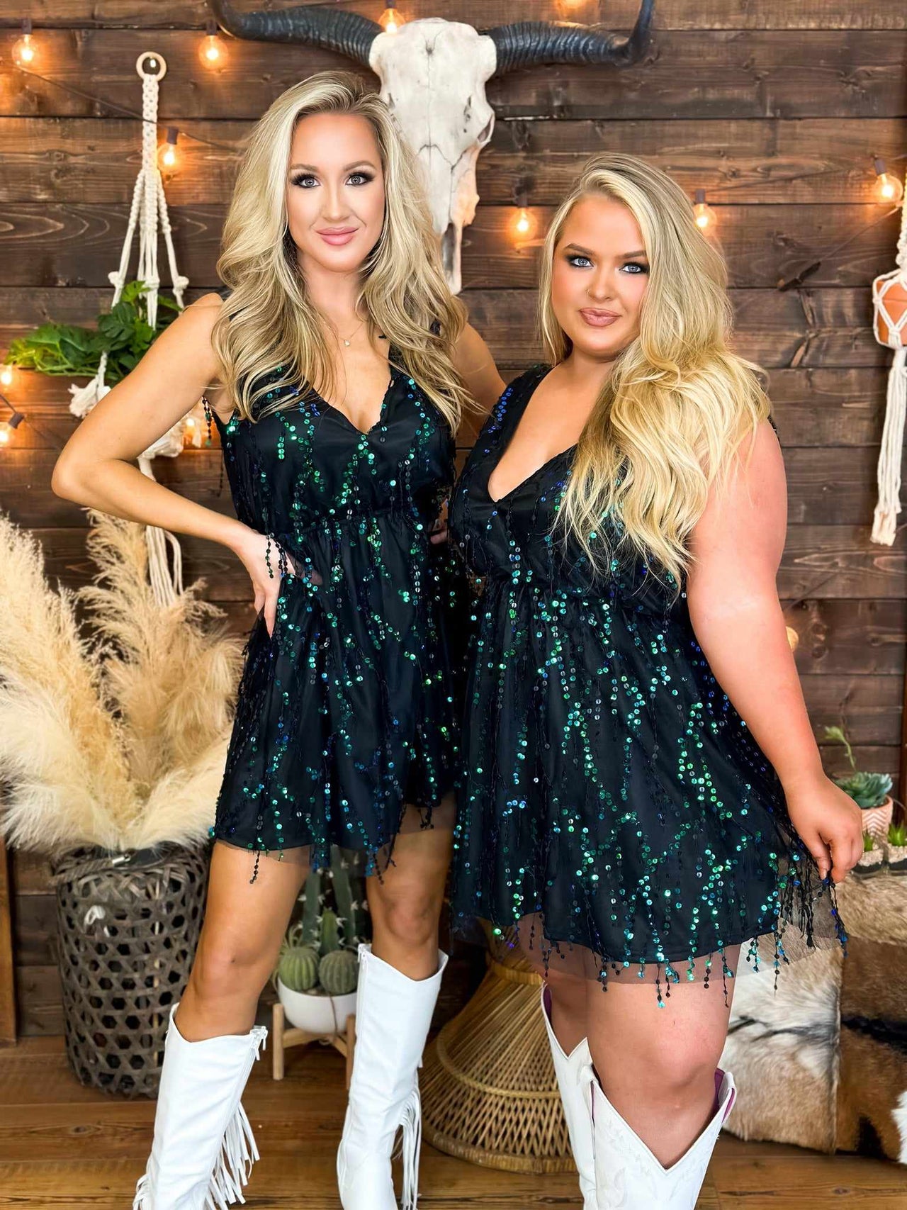 Little black dress with peacock sequin overlay available in plus size.