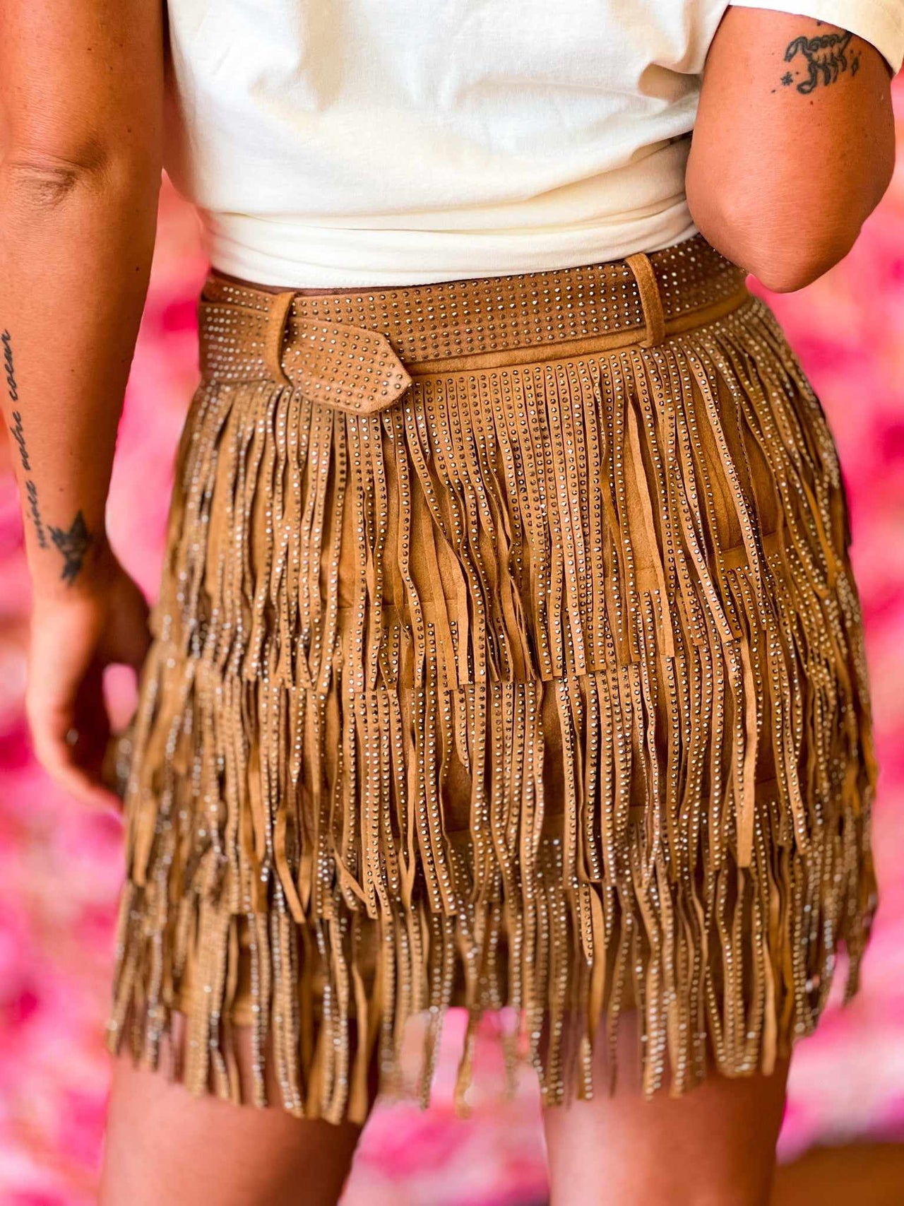Studded fringe mini skirt in brown.