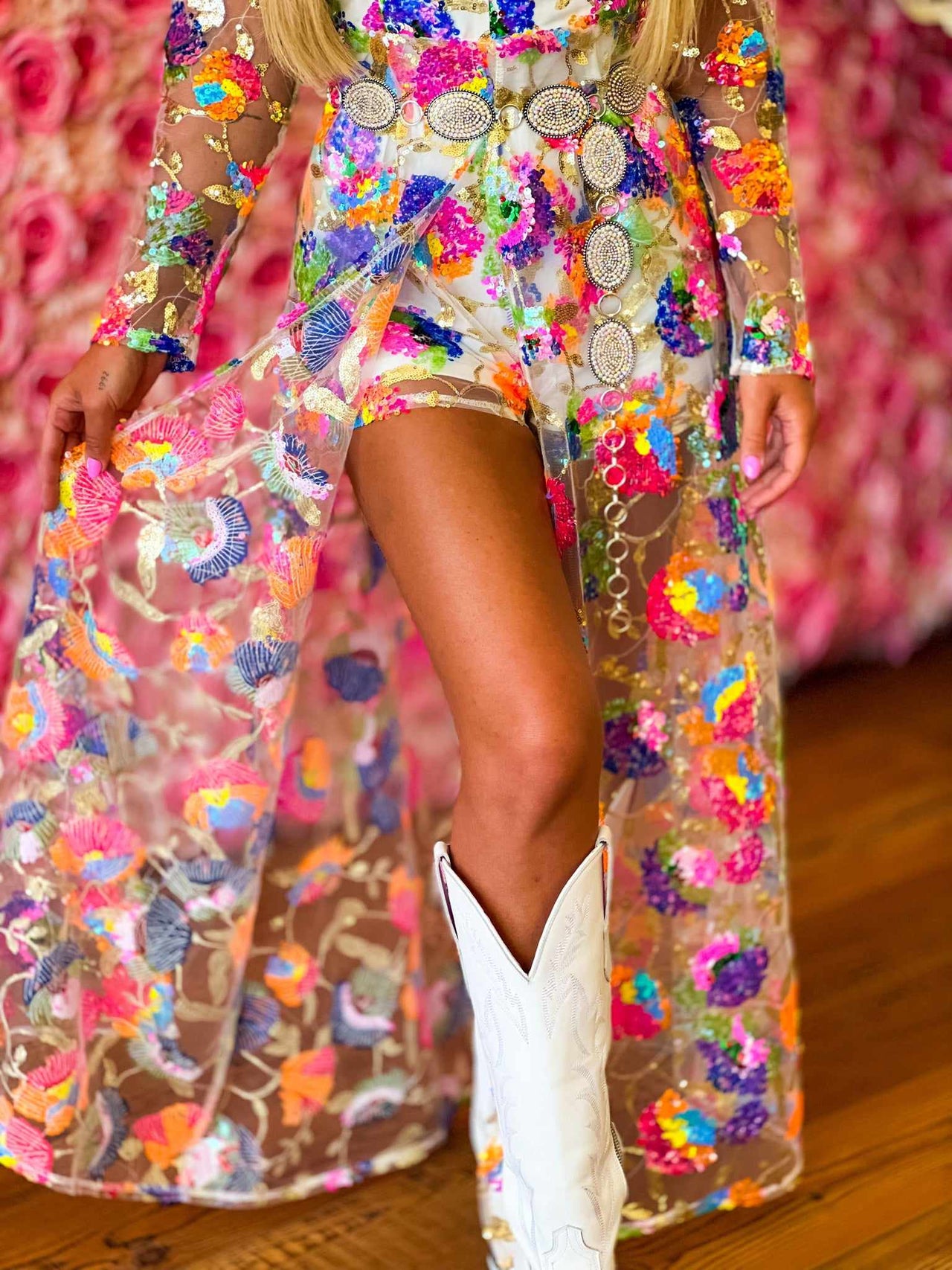 Split skirt overlay romper in sequin floral.