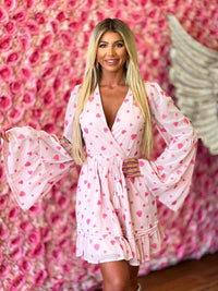 Thumbnail for Pink heart print wrap dress with bell sleeves.