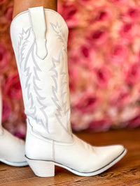 Thumbnail for White leather western boots with contrast stitching.