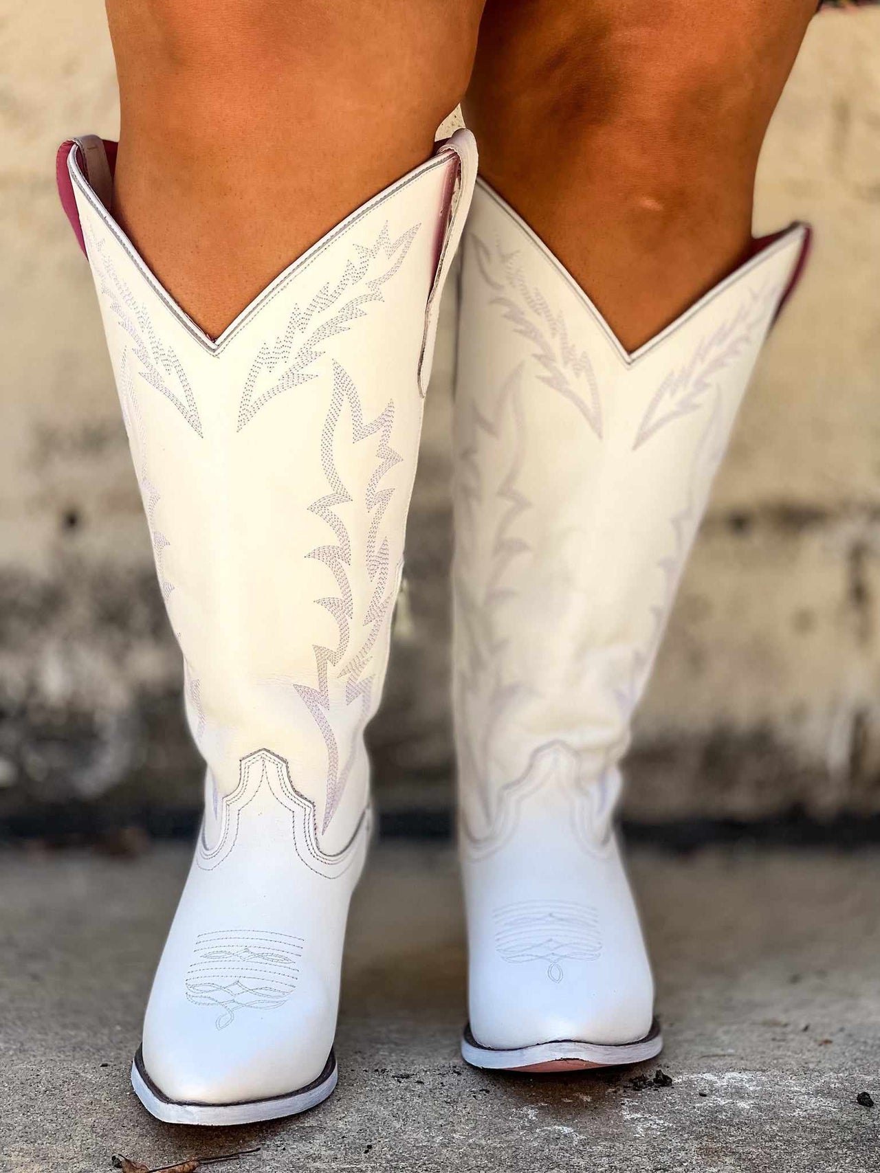 White wide calf western boots.