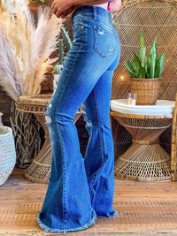 Thumbnail for boot cut distressed blue jeans