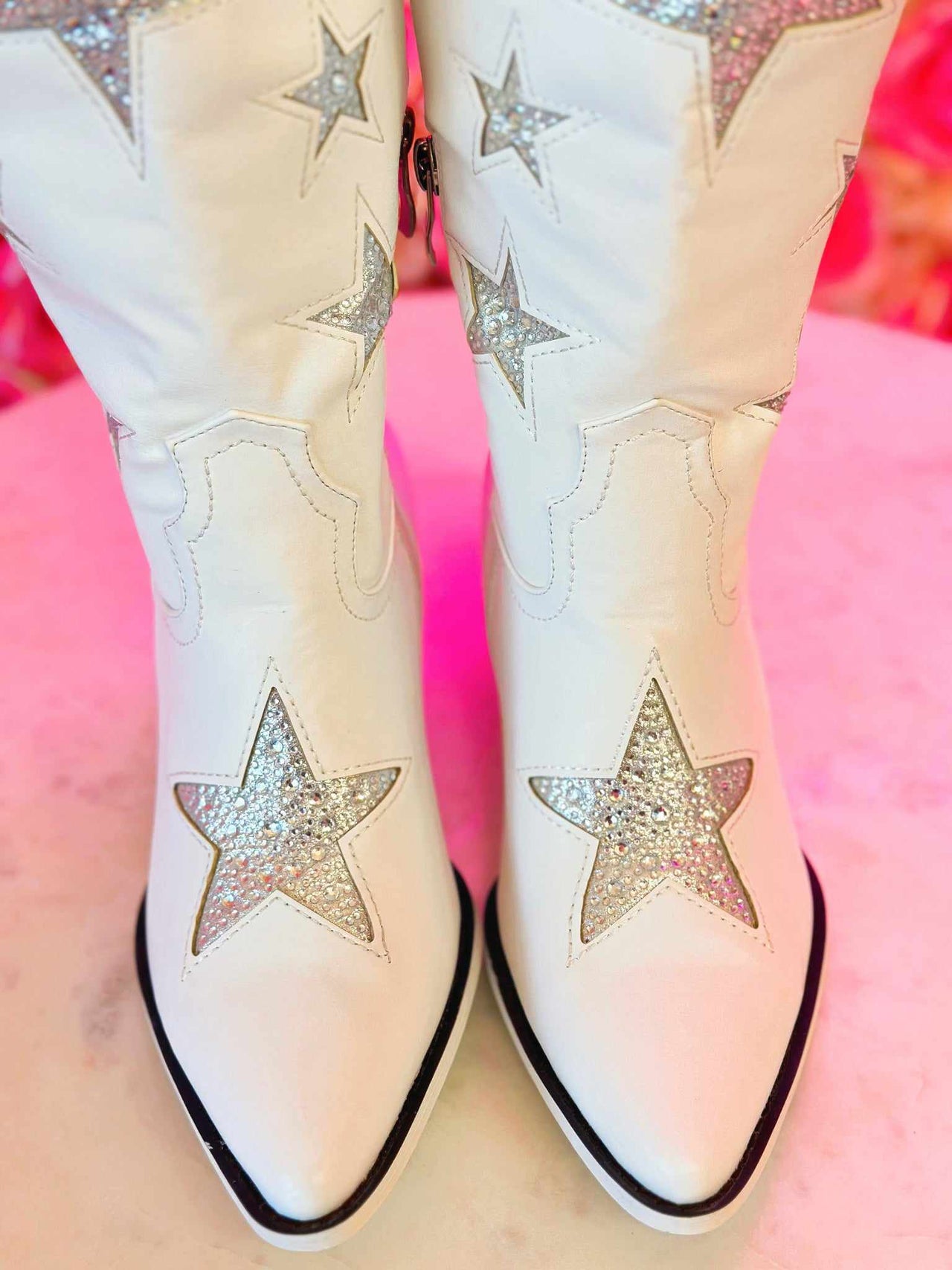 Star print white western boots.