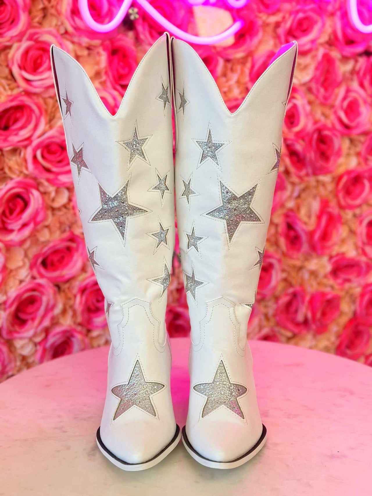 white wide leg cowgirl boots with stars.