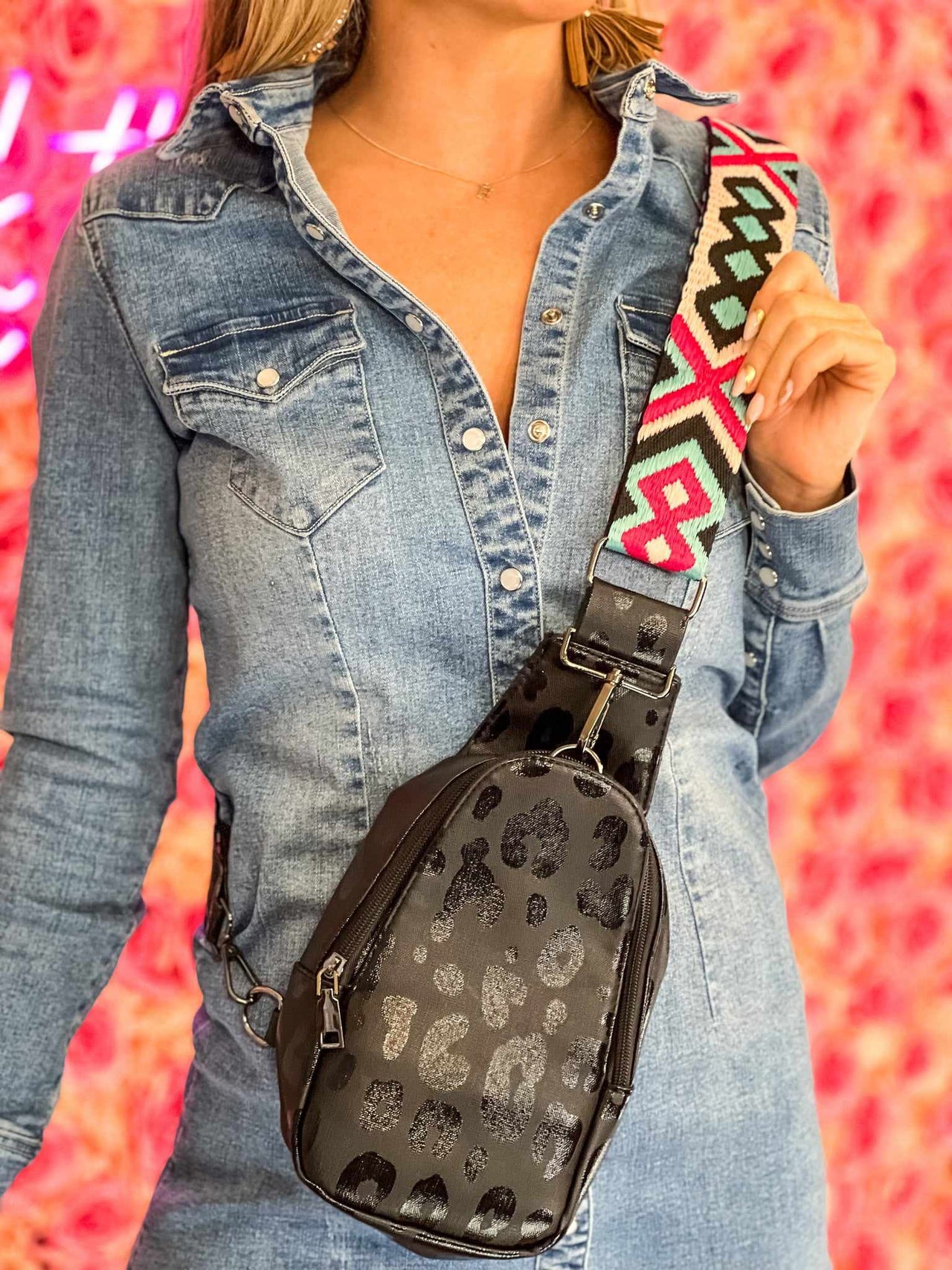 Black leopard sling bag with premium embroidered aztec print strap.