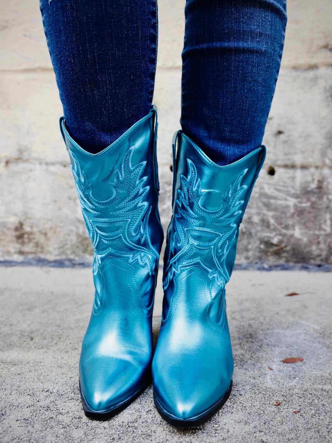 Metallic turquoise western short boots.