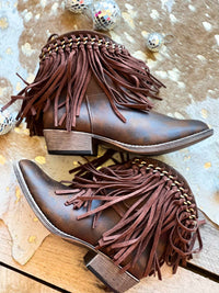 Thumbnail for Brown leather western booties with fringe.