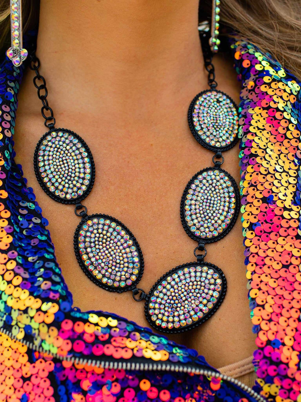 Black metal statement necklace with crystal beads. 