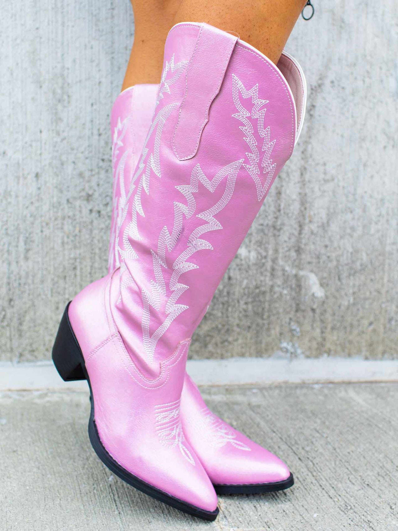 Light pink western cowgirl boots.