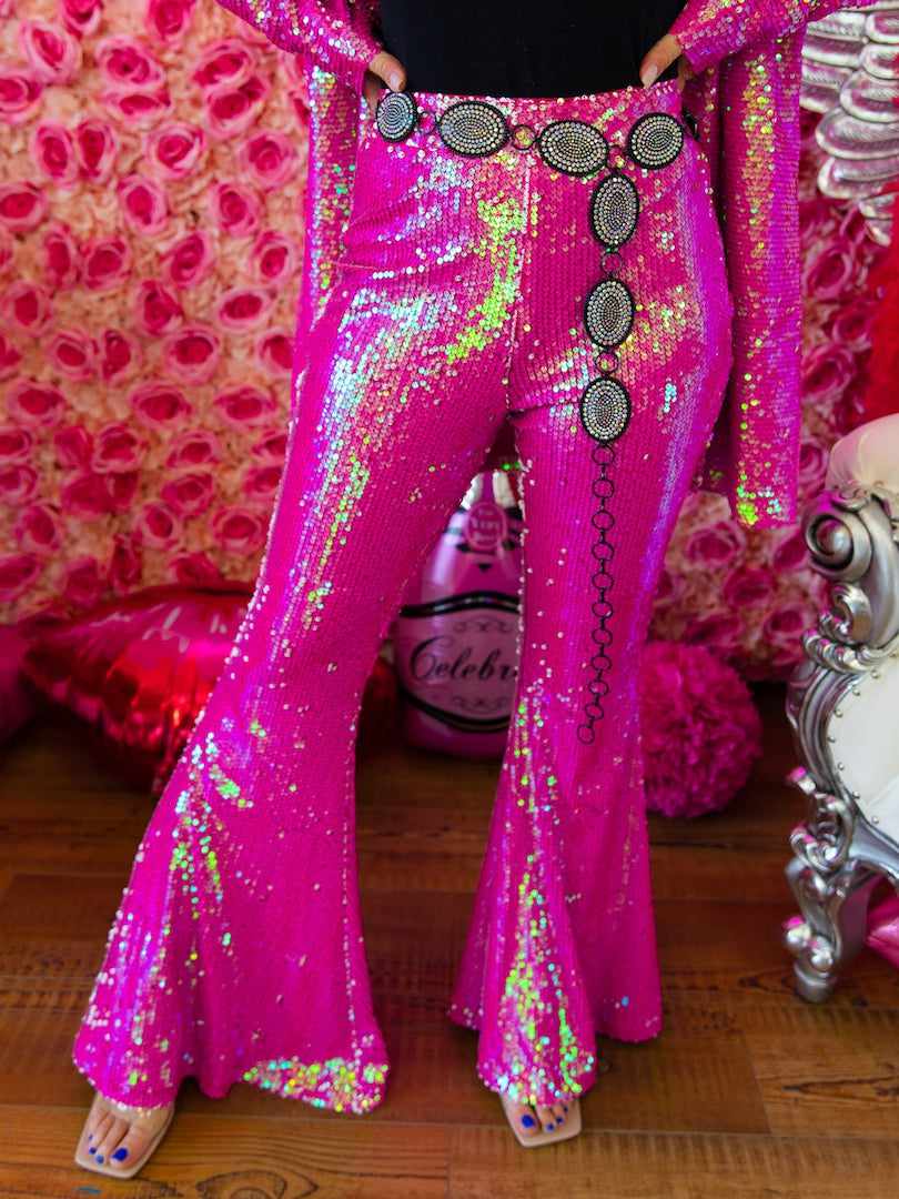 Pink sequin flare pants.